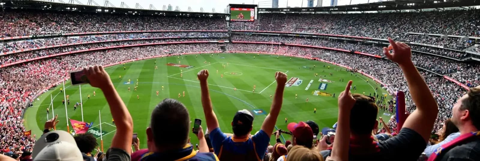 Fans cheering at the AFL Grand Final in Melbourne